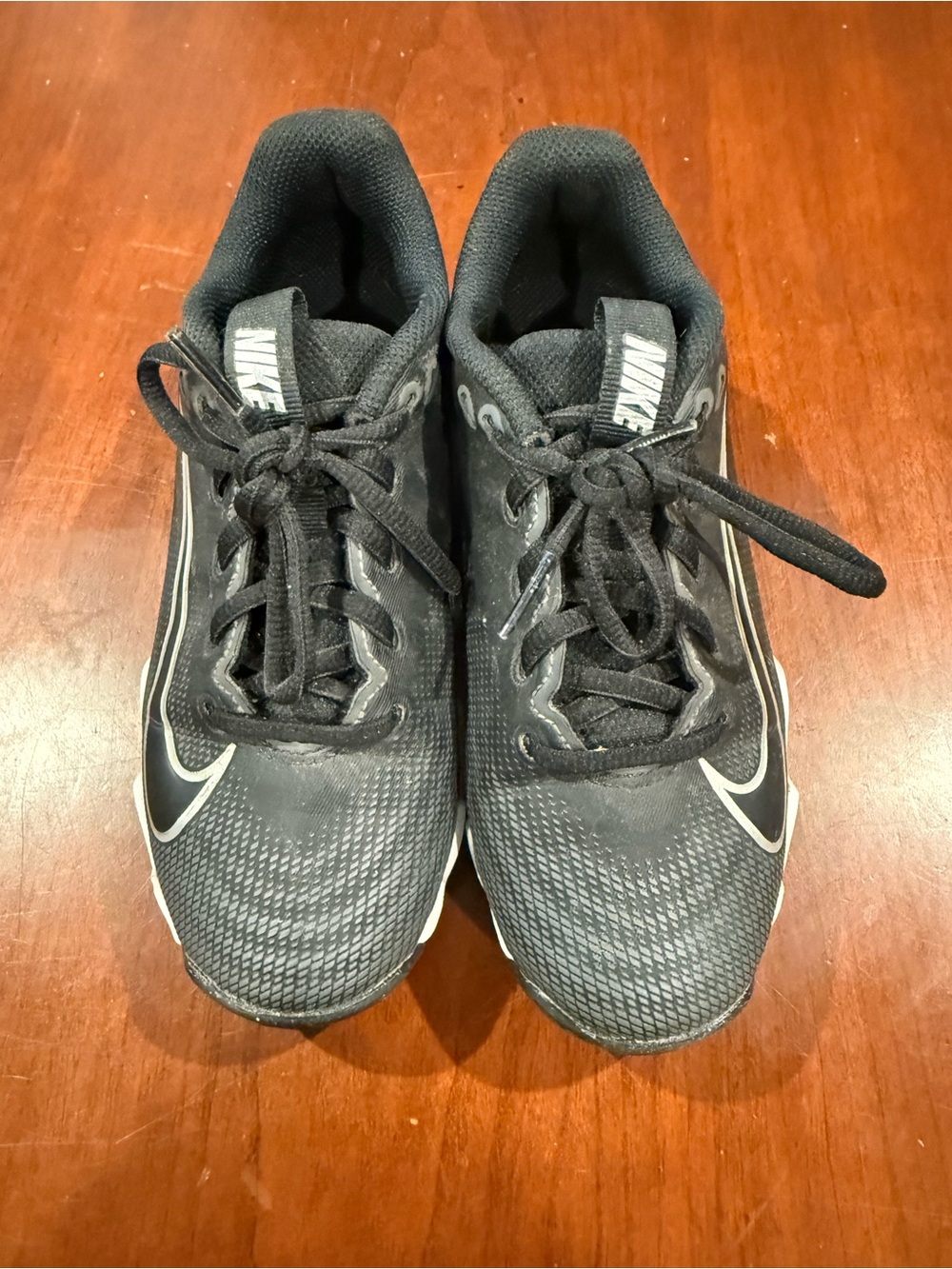 Nike Boys Black Athletic Cleats with White Swoosh Size 1.5